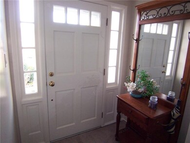 Welcoming entry, guest closet, slate flooring