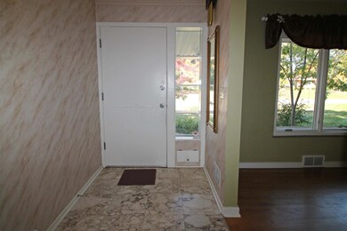 Foyer with marble flooring