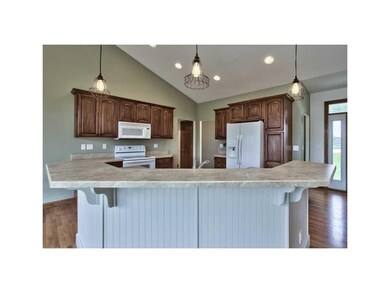 Kitchen. BREAKFAST BAR, KITCHEN PANTRY CLOSET.