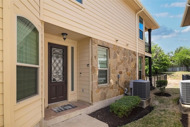 Property entrance featuring central air condition