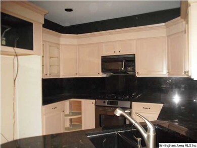 ANOTHER VIEW OF KITCHEN.