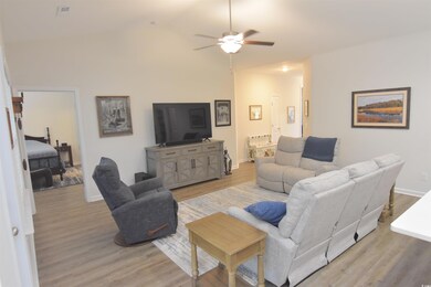 Living room featuring light wood-type flooring, ce
