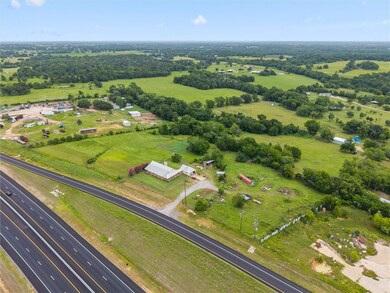 Aerial view of property and surrounding area