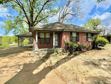View of front of property featuring covered porch,