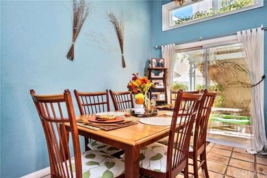 The large dining space has direct access to the ya