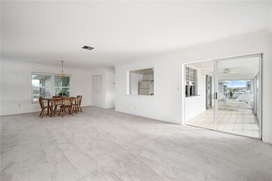 Living area with fresh paint and new carpet!