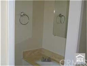 Convenient half bath downstairs off the living are