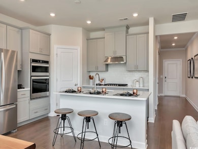 Photo is not of the actual home, but is an inspirational photo of builder’s model home.