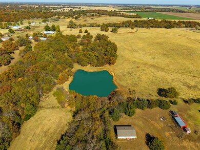 South west side Aerial view of sparsely populated area with a nearby body of water