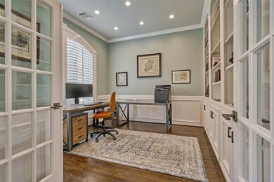 Glass French door entry to the study overlooking the front yard.