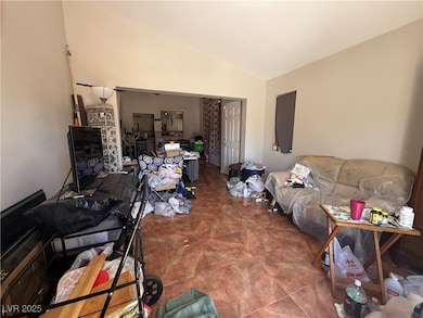 Living room with lofted ceiling