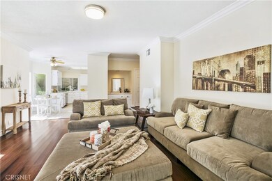 Family Room View to Kitchen and Full Wet Bar.