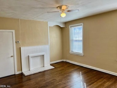 Living room, faces the street, Boissevain Ave.