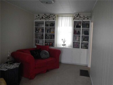 Living Room. Living room in the rear apartment