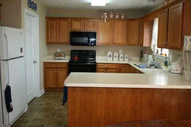 The kitchen has lots of cabinets and counter space. It also has a nice size pantry and comes with an appliance package.