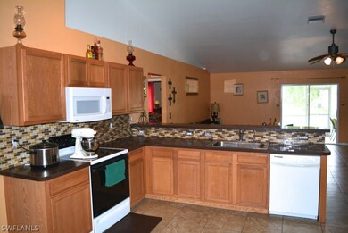 768 Barclay Ave, Lehigh Acres, FL 33974 - photo 2