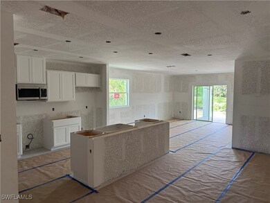 1039 Asther St E, Lehigh Acres, FL 33974 - photo 2