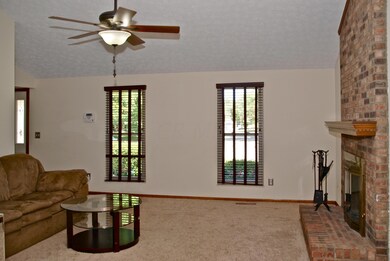 Family room windows w/ new blinds.