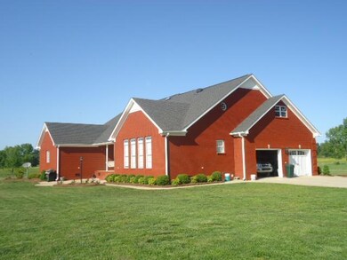 Angled Front/Side View of Home with Garage