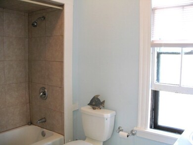 Tile surrounding the tub and fresh air from the wi