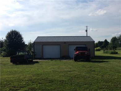 2 car detached garage with electricity.