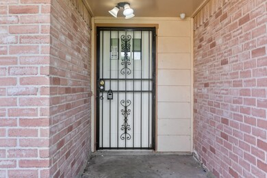 This is a front entryway featuring a secure wrough