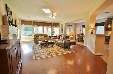 Wood floors through out. Beautiful windows in living room.