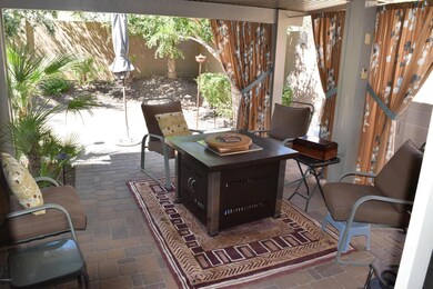 Private Covered Patio with Paver Stones