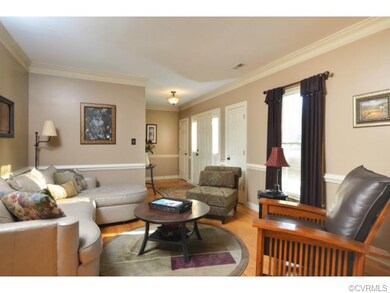 View of the living room looking into the foyer. Th