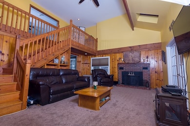 New Carpet, Cathedral Ceiling, Brick fireplace, so much space!