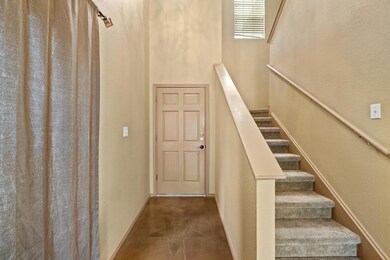 Staircase featuring baseboards