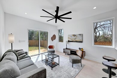 Living room with recessed lighting, a ceiling fan