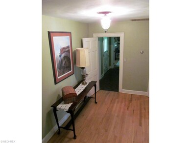 Gracious vestibule off entrance way featuring hard