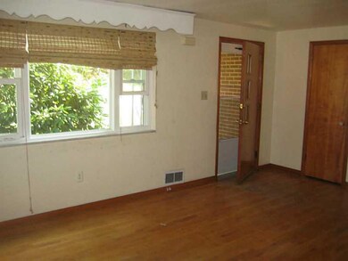 Living Room. A large window provides plenty of nat