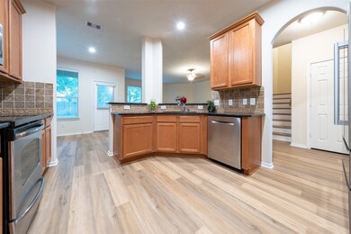 This spacious kitchen features stainless steel app