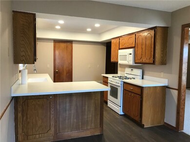 View of the kitchen from the dining area. Note tha