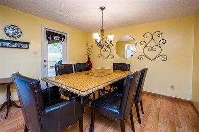 The oversized eat-n-kitchen has enough space for a