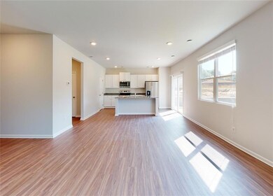 Unfurnished living room featuring light wood-type 
