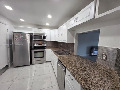 1351 NE 191st St unit E420, Miami, FL 33179 - photo 4