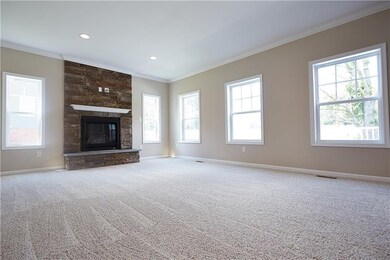 Family Room includes 3 windows with a view of back