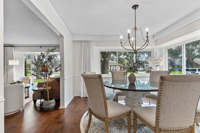 Custom draperies with old world chandelier