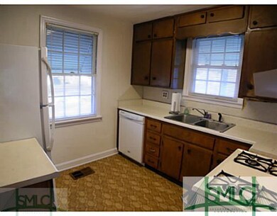 Kitchen. Gas stove, dishwasher & refrigerator.