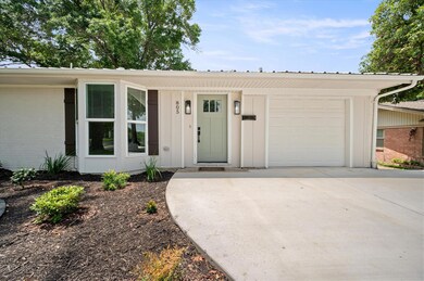 Front of house with new driveway