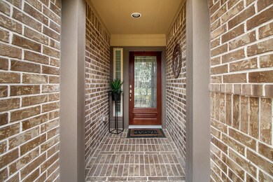 Front porch is very welcoming into your 4 bedroom, 3.5 baths and with a 2 car garage. 8 Foot door with elegant glass window light. ALL BRICK HOME!!!