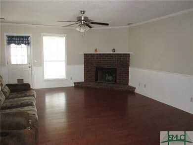 Large family room with brick wood burning fireplac