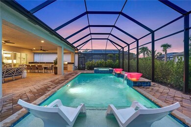 You are always on vacation here.  Large salt-water pool with sun shelf, spa with waterfall and custom illuminated water spill bowls.  Ahhhhhh