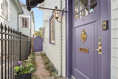 Side front entrance and back yard access.