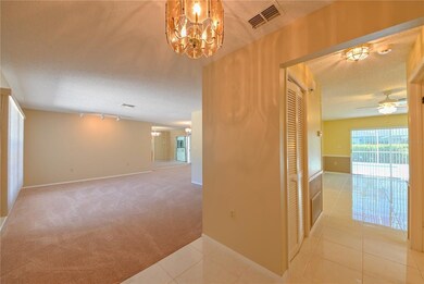 Formal Living/Dining Rooms to Left, Kitchen and Fa