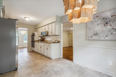 Kitchen with stainless steel appliances, tasteful 