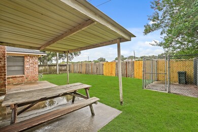 Home has a nice covered area, dog run, and is on t